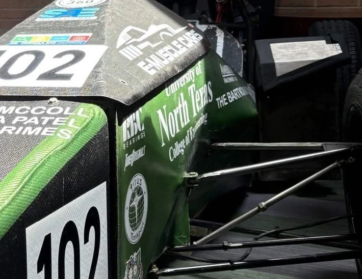 Actual Formula SAE racecar with visible aero and suspension hardware
